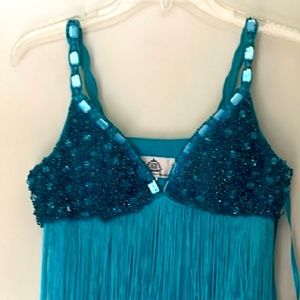 Turquoise fringe dress perfect for Latin dance. Message for more details.